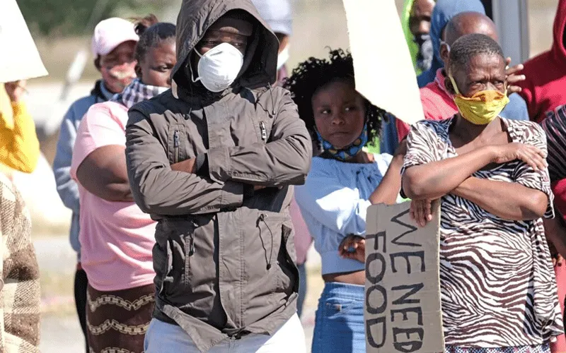 Some residents in South Africa protests over lack of food and jobs during the coronavirus pandemic. / Dino Lloyd/Gallo Images via Getty Images
