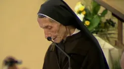 Pope Francis listens as Sister Marije Kaleta speaks in Tirana’s St. Paul Cathedral, Albania, Sunday, Sept. 21, 2014. Screenshot from Vatican News YouTube channel.