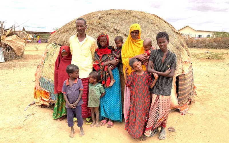 Habso’s family walked for 20 days from Wajid Region to Luuq town in Gedo Region, southern Somalia (approx. 70 kms) when the last of their goats died and they had no food to sustain the family. Left to right back row: Anab (7); Father Ibrahim Yarow (49); Habiba (8); Habso (3); mother Abshiro Adn Mohammad, (35), baby Nasra (8 months); Hassan (9). Front row: Abdi Nassir (5); Abdifatah (4) and Fartun (6) Pic: Miriam Donohoe. Credit: Trócaire