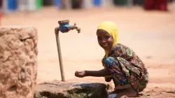 A child drinking tap water at the distribution base in kabasa Somalia. Credit: Trócaire