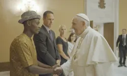 Pope Francis meets Arouna Kandé, one of the subjects of the documentary “The Letter.” | Photo credit: Laudato Si’ Movement