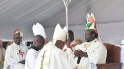 Archbishop Siegfried Mandla Jwara hands the crosier to Bishop Elias Kwenzakufani Zondi during the May 27 Episcopal Ordination. Credit: SACBC