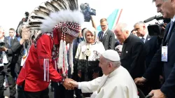 Pope Francis is greeted by a representative of Canada's indigenous peoples upon his arrival in Edmonton, Alberta, on July 24, 2022 at the start of his six-day visit to Canada. Vatican Media