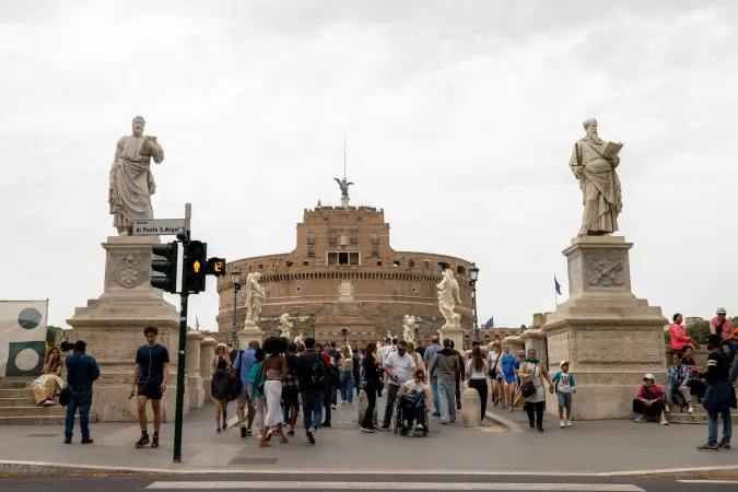 Sts. Peter and Paul, the patron saints of Rome, guard the entrance to Ponte Sant’Angelo, welcoming pilgrims as they begin their journey toward St. Peter’s Basilica.