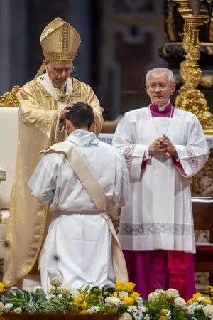 Pope Leo XIV lays hands on one of 11 men during priestly ordinations at St. Peter's Basilica on May 31, 2025.