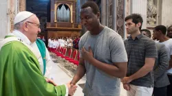 Pope Francis greets migrants July 6, 2018 after Mass for the anniversary of his visit to Lampedusa. Credit: Vatican Media.