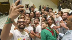 Pope Francis takes a selfie with members of the International Eucharistic Youth Movement in the Vatican's Paul VI Hall, Aug. 7, 2015. Credit: L'Osservatore Romano.