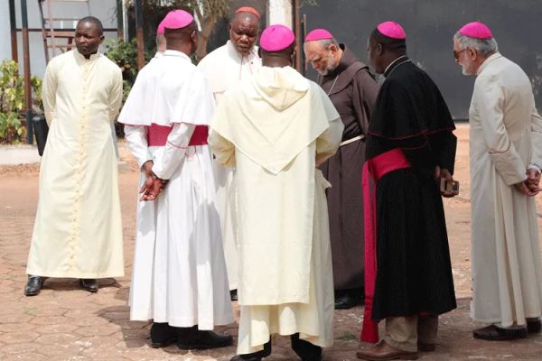 Members of the Central African Episcopal Conference (CECA) in consultation before a meeting with President Faustin-Archange Touadéra. Credit: Courtesy Photo