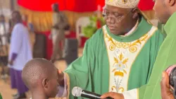 Archbishop Ignatius Kaigama administers the Sacrament of Confirmation at Holy Spirit Pastoral Area, Byazhin of Abuja Archdiocese. Credit: Abuja Archdiocese