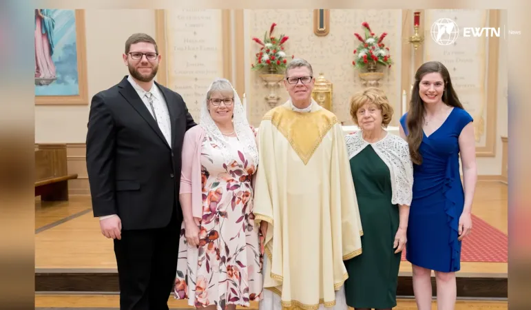 Father Travis Moger on the day of his ordination alongside his son, Mark; wife, Amelia; mother; and daughter, Maddy. | Credit: EWTN News screenshot
