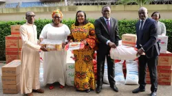 Members of government present President Alassane Ouattara's donation to the national Coordinator of Caritas Ivory Coast, Fr. Jean-Pierre Tanoh Tiemele. Credit: Caritas Ivory Coast