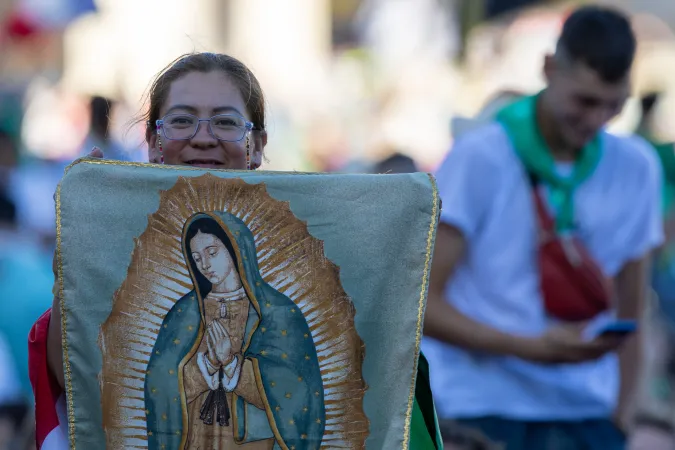 A young woman holds an image of Our Lady of Guadalupe during the Jubilee of Youth welcome Mass on July 29, 2025, in St. Peter’s Square at the Vatican.
