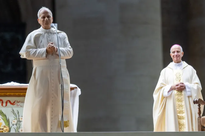 Pope Leo XIV addresses the crowd following his unexpected ride around St. Peter’s Square at the Vatican following the Jubilee of Youth welcome Mass — which was celebrated by Archbishop Rino Fisichella (right) — on July 29, 2025.