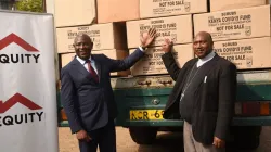 Bishop Joseph Mbatia (right) receiving a donation of  Personal Protective Equipment (PPE) from Equity bank, a Kenya-based financial institution/ Credit: Courtesy Photo