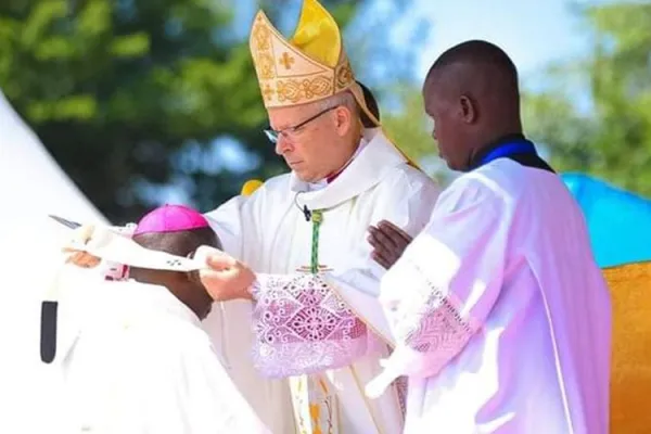 Archbishop Hubertus van Megen imposes the Pallium on Archbishop Maurice Muhatia Makumba of the Archdiocese of Kisumu in Kenya. Credit: Courtesy Photo