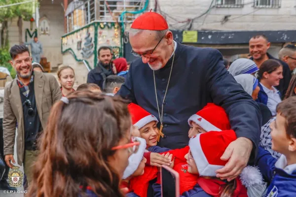 Children greet the Latin patriarch of Jerusalem, Cardinal Pierbattista Pizzaballa, during his visit to Gaza’s Holy Family Parish on Dec. 19, 2025. / Credit: Photo courtesy of the Latin Patriarchate of Jerusalem