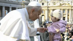 Pope Leo XIV greets a baby during the general audience in November 2025. / Credit: Vatican Media