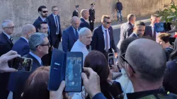 Pope Leo XIV answers questions from the media outside Castel Gandolfo in Italy on Oct. 7, 2025. / Credit: Hannah Brockhaus/CNA