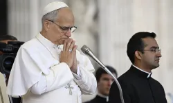 Pope Leo XIV prays during his general audience on 24 Sept 2025, in St. Peter’s Square at the Vatican.