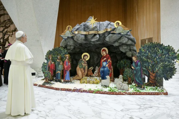 Pope Leo admires the Nativity scene that was made in Costa Rica. / Credit: Vatican Media