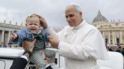 Pope Leo XIV greets a baby during his general audience in St. Peter’s Square at the Vatican on Wednesday, Oct. 22, 2025 / Credit: Vatican Media