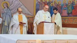 Father Gabriel Romanelli with Cardinal Pierbattista Pizzaballa, Latin Patriarch of Jerusalem, celebrating Christmas Mass at Holy Family Parish in Gaza, in December 2024. / Credit: Courtesy of the Latin Patriarchate of Jerusalem.
