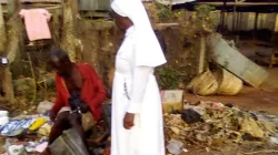 Sr. Esther Nkiru Ezedinachi stops to exchange pleasantries with a mentally challenged man on the streets of Nigeria's Anambra State
Credit: Sr. Esther Nkiru Ezedinachi