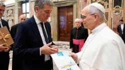 Pope Leo XIV meets the president of the Italian Anti-Usury Council, Luciano Gualzetti, on Oct. 18, 2025. / Credit: Vatican Media